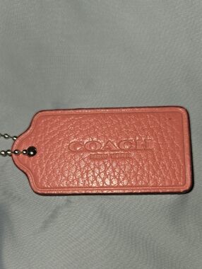 Coach Coral Pink Pebbled Leather Bag Tag